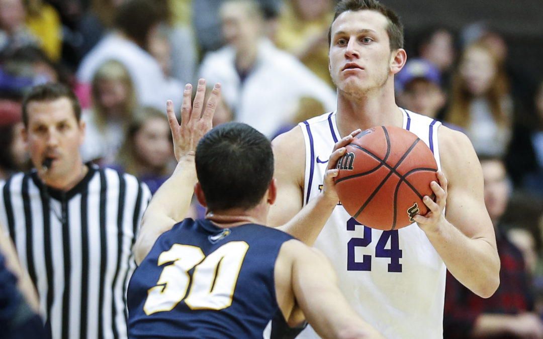 Strong second half propels Bisons past Emory in season opener